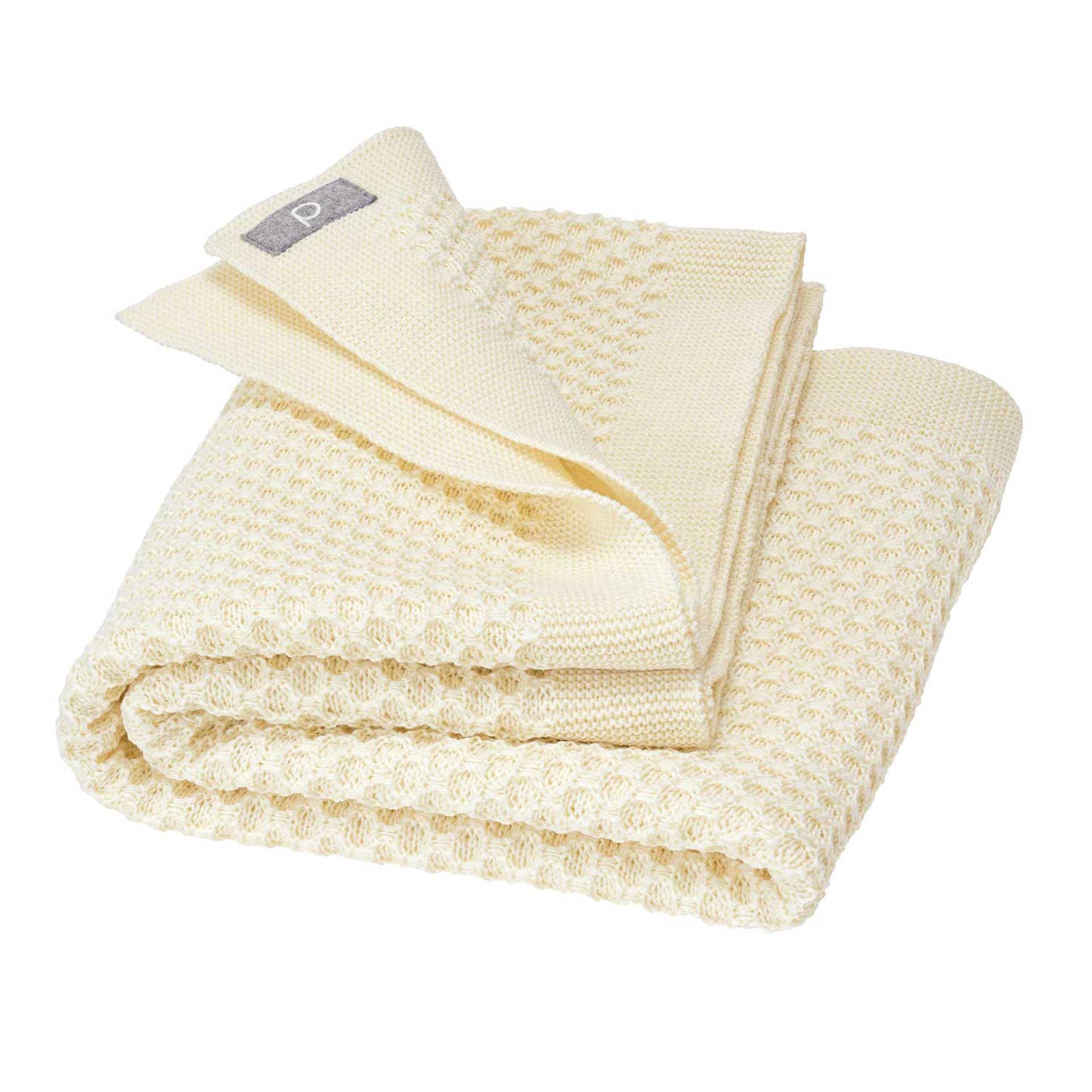 Waben-Strickdecke Waben-Strickdecke